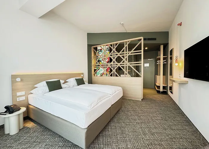 فندق Arcotel Aq